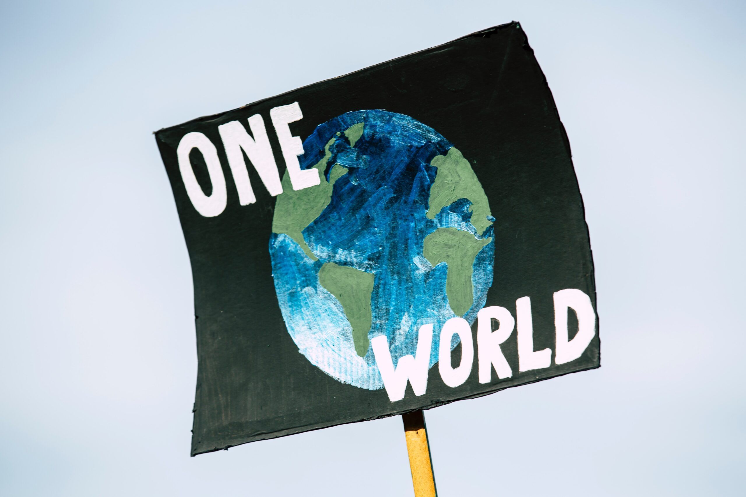 pancarta one world cambio climatico